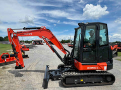 Kubota KX040-5 excavator side view showing boom, arm and rubber tracks