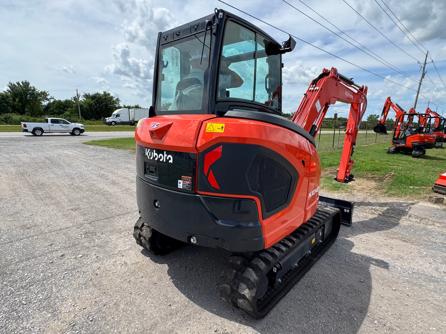 Kubota KX040-5 excavator rear view with conventional tail swing counterweight