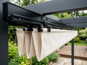 Detail of the retractable canopy slider and black aluminum rail of the steel pergola